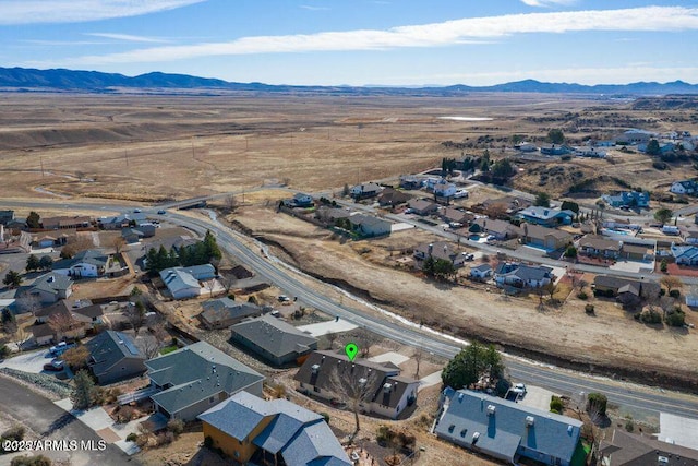 bird's eye view featuring a residential view and a mountain view