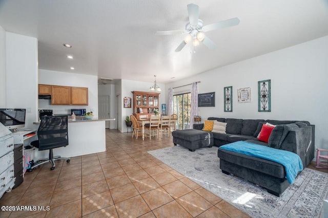 living area featuring a ceiling fan, recessed lighting, and light tile patterned flooring