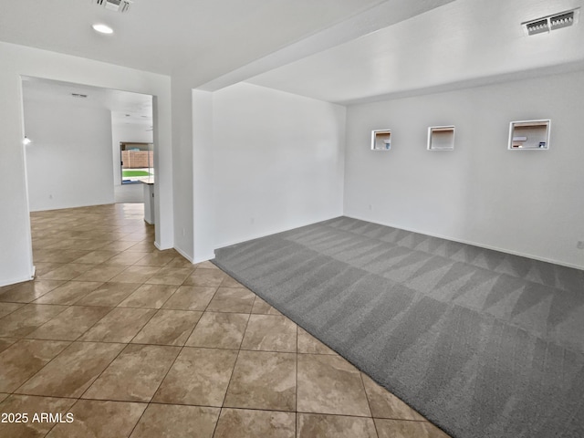 8616 S 57th Dr, Laveen, AZ 85339 - tiled empty room featuring visible vents and carpet