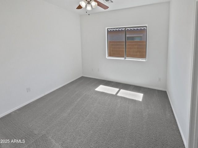 8616 S 57th Dr, Laveen, AZ 85339 - spare room with visible vents, baseboards, a ceiling fan, and carpet