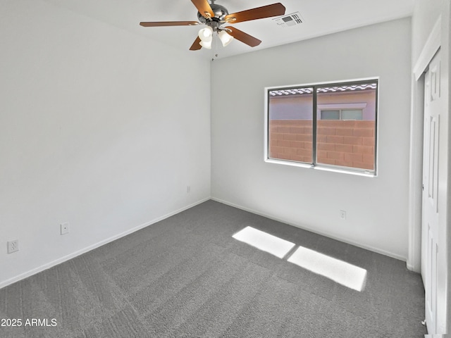 8616 S 57th Dr, Laveen, AZ 85339 - carpeted empty room with ceiling fan, baseboards, and visible vents