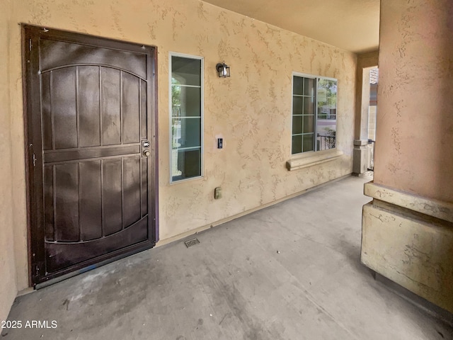 8616 S 57th Dr, Laveen, AZ 85339 - doorway to property with stucco siding