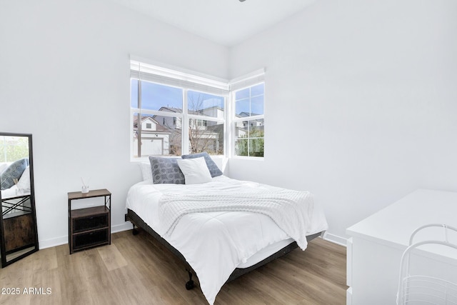 bedroom featuring hardwood / wood-style floors