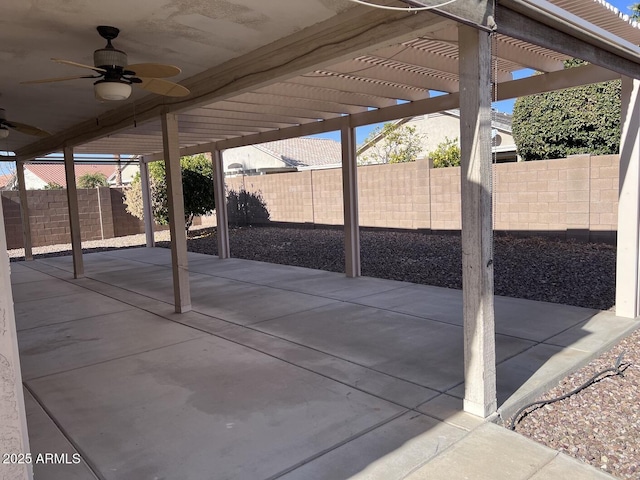 view of patio with ceiling fan and a pergola