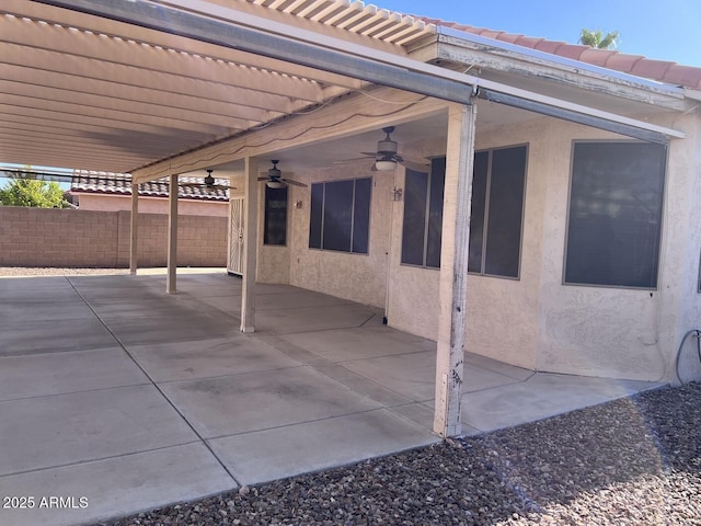 view of patio / terrace featuring ceiling fan