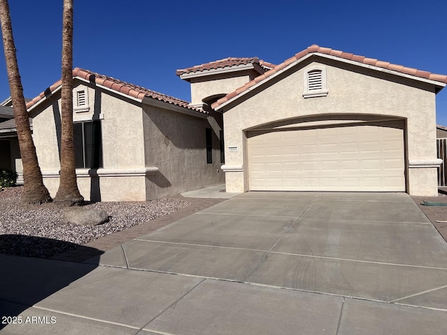 view of front of house with a garage