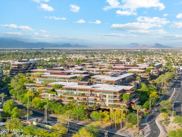 birds eye view of property featuring a mountain view