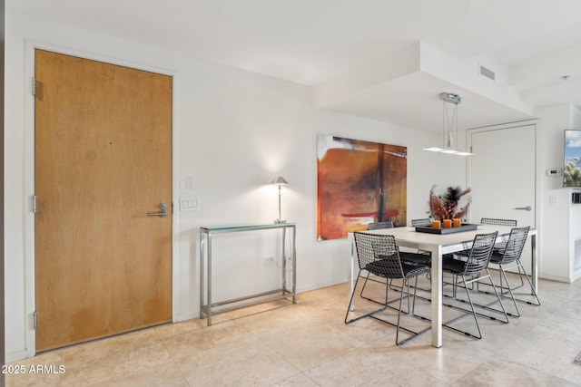 dining space with baseboards