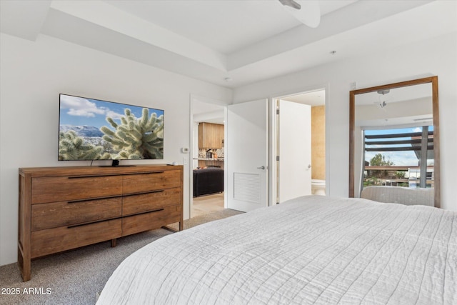 bedroom with carpet floors, visible vents, and ensuite bathroom