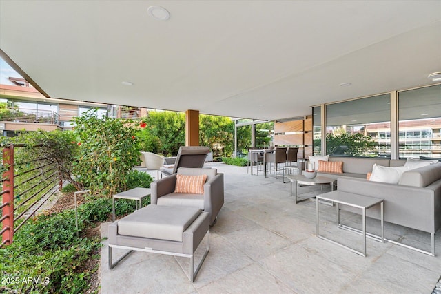 view of patio / terrace with fence and outdoor lounge area