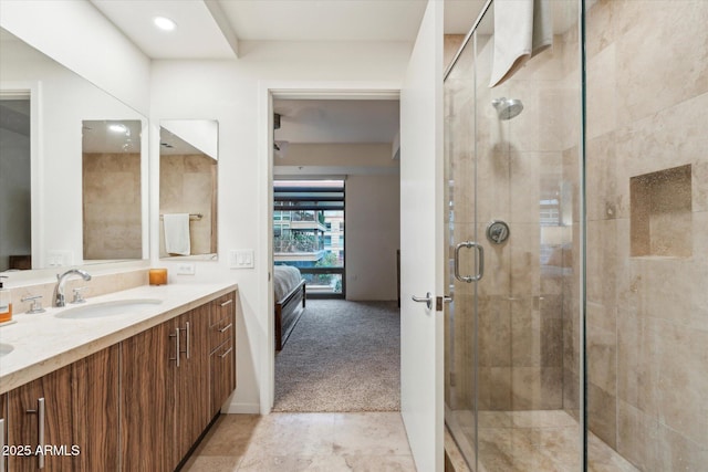 ensuite bathroom with vanity, tile patterned flooring, recessed lighting, connected bathroom, and a stall shower