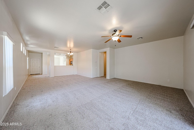 5418 W Carson Rd, Laveen, AZ 85339 - empty room featuring light carpet and ceiling fan