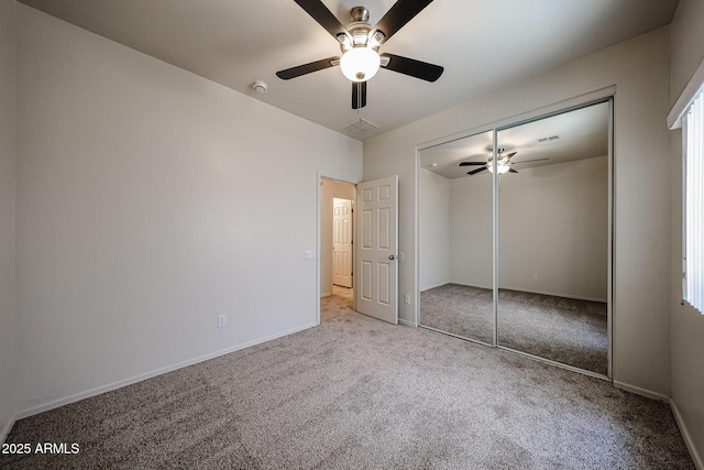 5418 W Carson Rd, Laveen, AZ 85339 - unfurnished bedroom with carpet floors, ceiling fan, and a closet