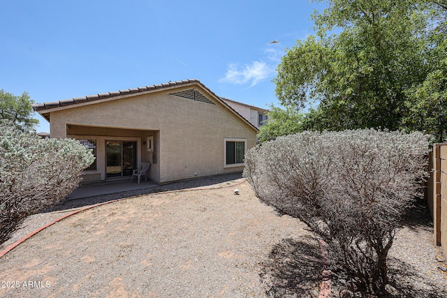 5418 W Carson Rd, Laveen, AZ 85339 - back of property with stucco siding and a patio