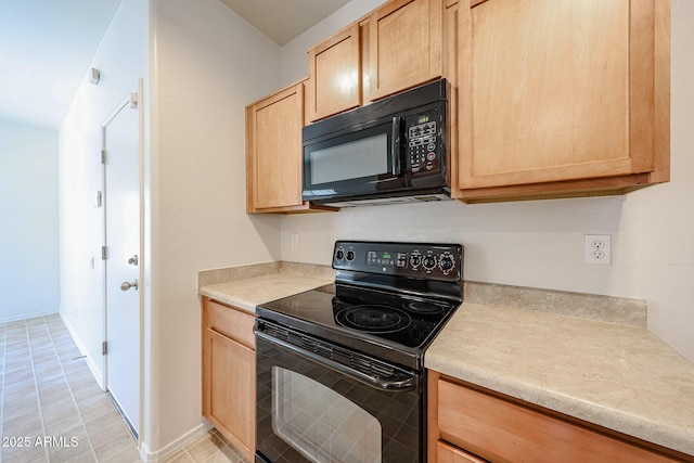5418 W Carson Rd, Laveen, AZ 85339 - kitchen with black appliances, light brown cabinets, and light countertops