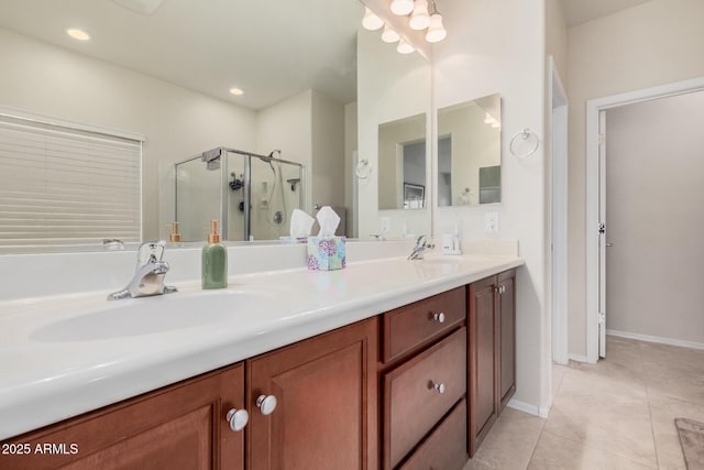 bathroom featuring walk in shower, tile patterned floors, and vanity