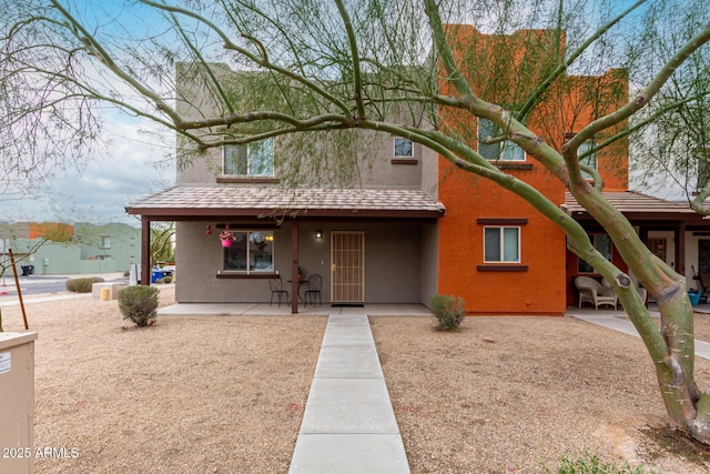 view of front of house featuring a patio area