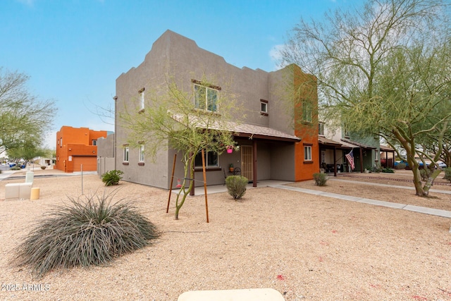 view of pueblo revival-style home