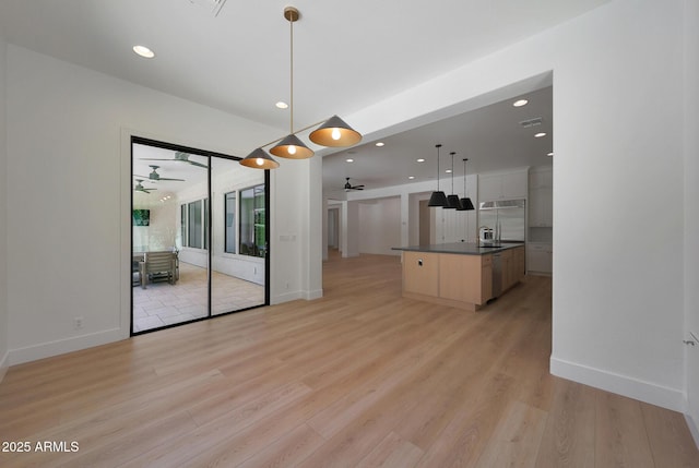 2859 E Los Altos Rd, Gilbert, AZ 85297 - kitchen featuring ceiling fan, dark countertops, stainless steel built in refrigerator, light wood finished floors, and recessed lighting
