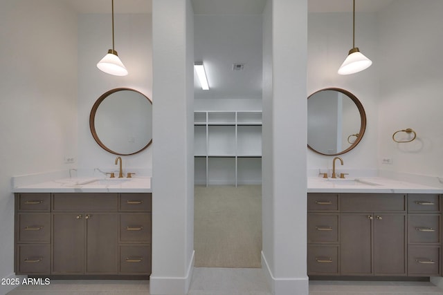 2859 E Los Altos Rd, Gilbert, AZ 85297 - full bathroom with two vanities and a walk in closet