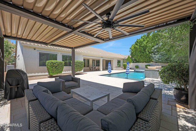2859 E Los Altos Rd, Gilbert, AZ 85297 - fenced backyard featuring an outdoor living space, area for grilling, a patio, and a hot tub