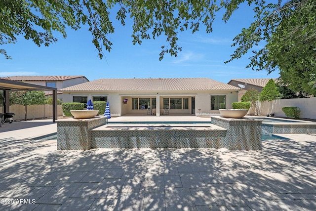 2859 E Los Altos Rd, Gilbert, AZ 85297 - view of pool with a fenced backyard, a patio, and a pool with connected hot tub
