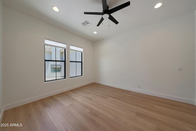 2859 E Los Altos Rd, Gilbert, AZ 85297 - empty room with a ceiling fan, light wood-style flooring, and recessed lighting