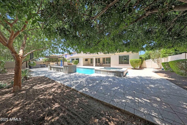 2859 E Los Altos Rd, Gilbert, AZ 85297 - view of swimming pool with a patio, a fenced backyard, an outdoor living space, and a pool with connected hot tub