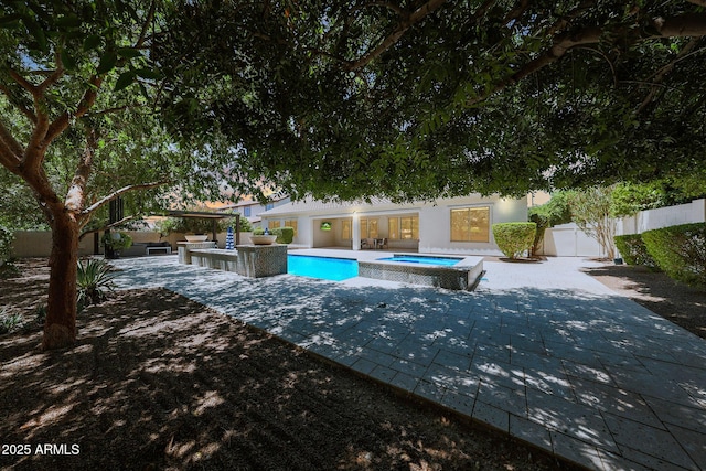 2859 E Los Altos Rd, Gilbert, AZ 85297 - view of swimming pool featuring a patio area and a pool with connected hot tub