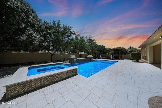 2859 E Los Altos Rd, Gilbert, AZ 85297 - view of swimming pool featuring a patio area, a pool with connected hot tub, and a fenced backyard
