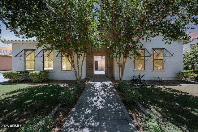 2859 E Los Altos Rd, Gilbert, AZ 85297 - view of front of property with stucco siding and a front yard
