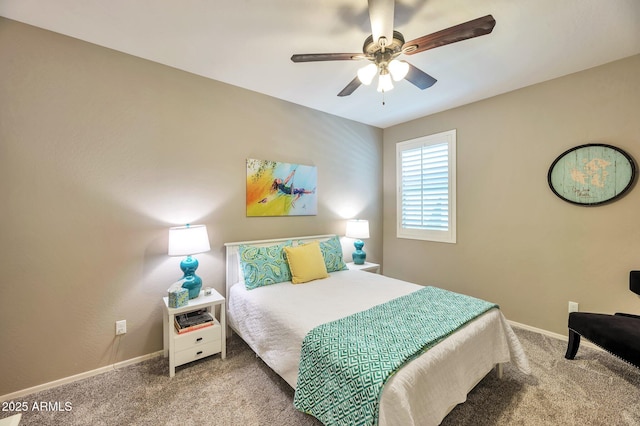 carpeted bedroom with baseboards and a ceiling fan