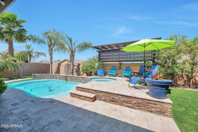 view of pool with a fenced backyard, an in ground hot tub, a fenced in pool, and a patio