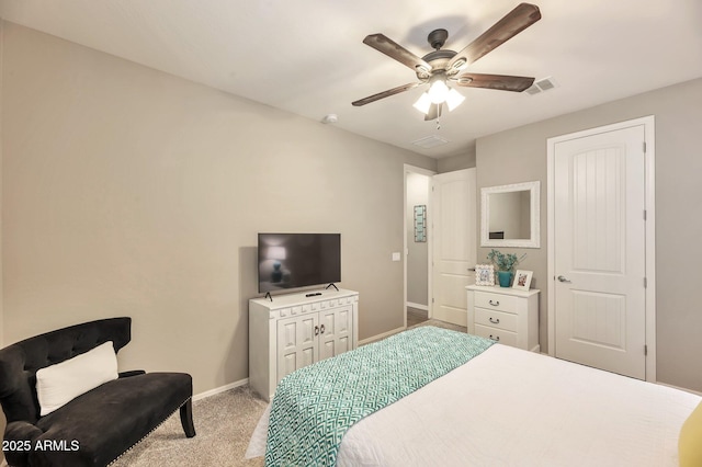 bedroom featuring visible vents, baseboards, carpet flooring, and ceiling fan