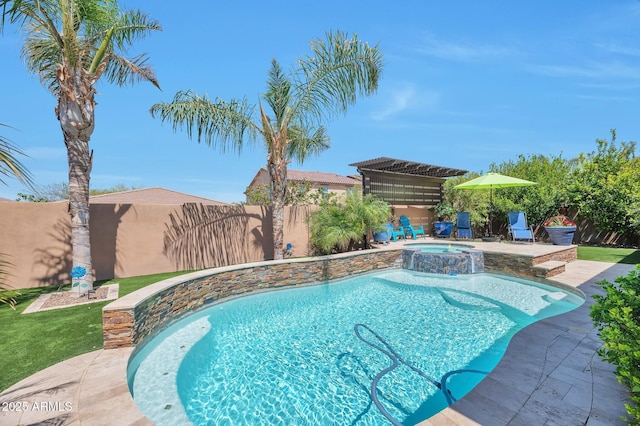 view of swimming pool featuring a fenced backyard, a pool with connected hot tub, and a patio