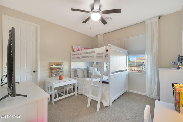 bedroom featuring light colored carpet and ceiling fan