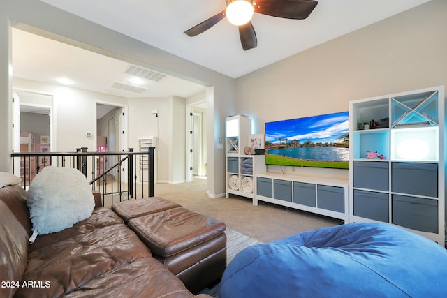 living room with carpet flooring and ceiling fan