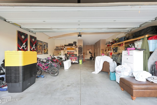 garage featuring a garage door opener