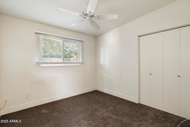1939 E Alameda Dr, Tempe, AZ 85282 - unfurnished bedroom featuring dark colored carpet, a closet, baseboards, and ceiling fan