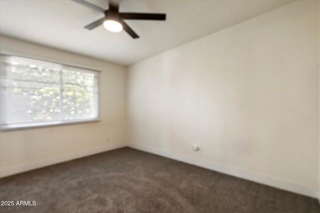 1939 E Alameda Dr, Tempe, AZ 85282 - empty room featuring dark carpet, ceiling fan, and baseboards