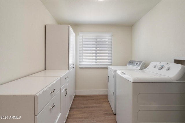1939 E Alameda Dr, Tempe, AZ 85282 - laundry area with separate washer and dryer, cabinet space, baseboards, and light wood-style flooring