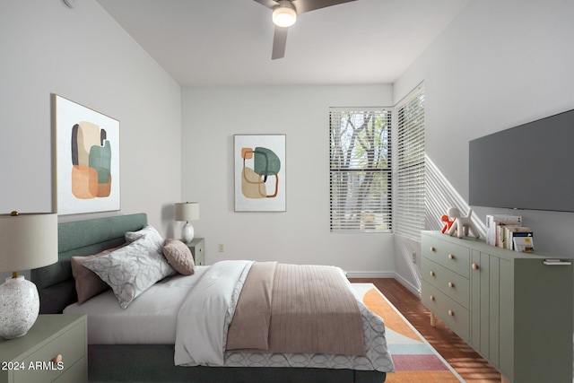 bedroom featuring ceiling fan and dark hardwood / wood-style flooring