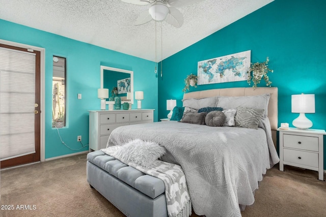 bedroom featuring light carpet, a textured ceiling, and ceiling fan