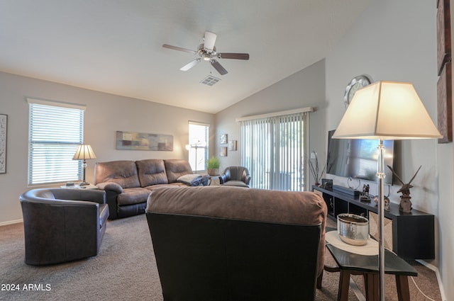 carpeted living room featuring vaulted ceiling and ceiling fan