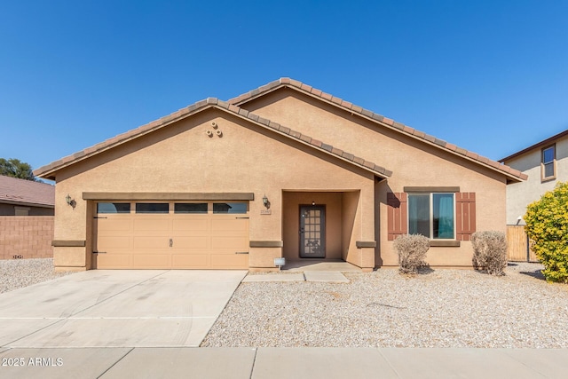 view of front of home with a garage