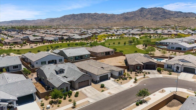 aerial perspective of suburban area with a mountain backdrop