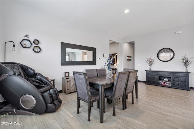 dining area featuring recessed lighting, light wood finished floors, and baseboards