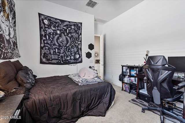 bedroom with carpet and baseboards