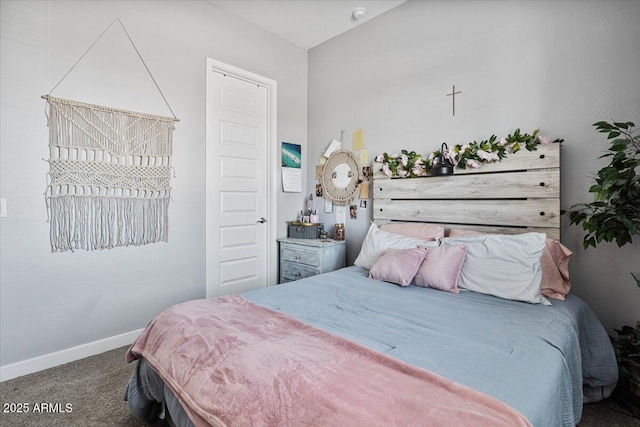 bedroom featuring carpet floors and baseboards