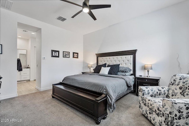 bedroom with light carpet, a ceiling fan, and baseboards
